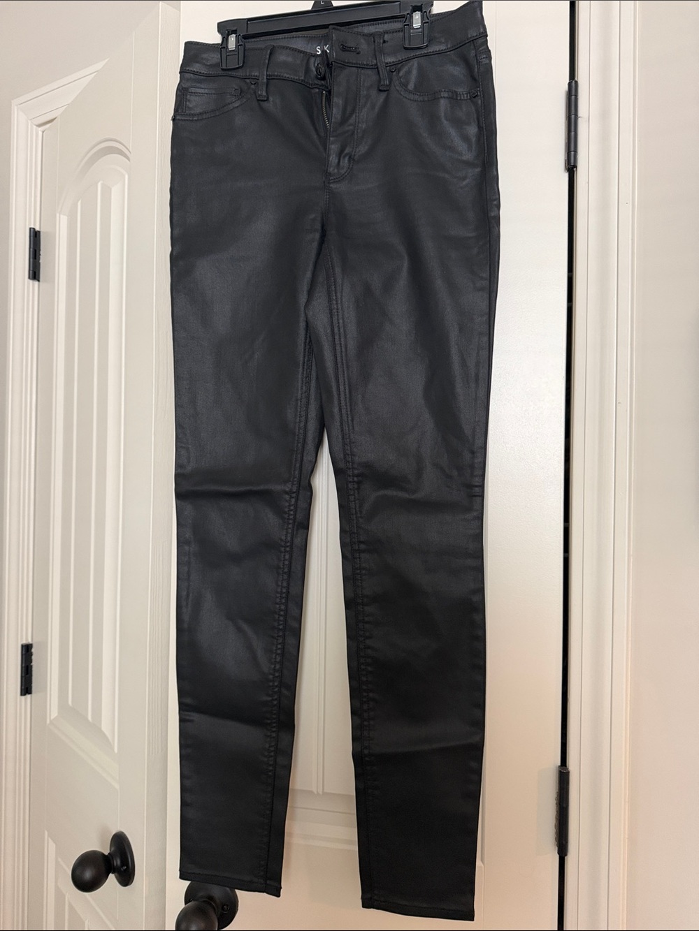 White House Black Market Black Coated Skinny Jeans